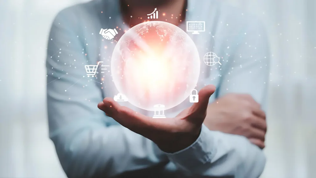 Una persona sosteniendo en su mano un holograma brillante de la Tierra, rodeada de iconos digitales.