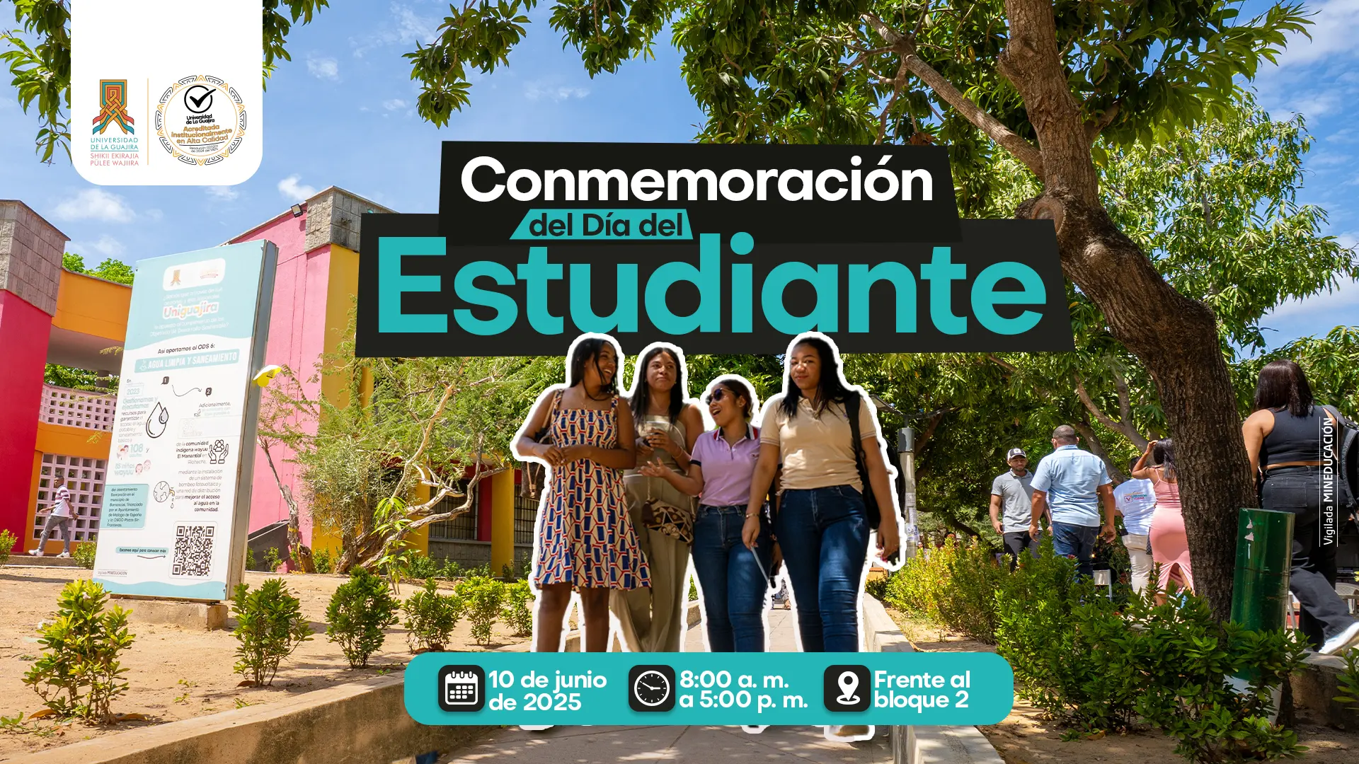 La imagen es un póster promocional para un evento de conmemoración del Día del Estudiante. La foto principal muestra a un grupo de estudiantes caminando al aire libre en un campus universitario, rodeados de vegetación y edificios. Sobre la imagen, en la parte superior, hay un título grande en negrita: "Conmemoración del Día del Estudiante". En la parte inferior de la imagen se superponen tres iconos con información sobre el evento: un calendario que indica la fecha "10 de junio de 2025", un reloj que señala el horario "8:00 a. m. a 5:00 p. m.", y un icono de ubicación que dice "Frente al bloque 2". En la parte superior izquierda del cartel, se ven logos de la Universidad de La Guajira y del Ministerio de Educación. En el fondo, en el lado izquierdo de la imagen, hay un banner vertical con un código QR.