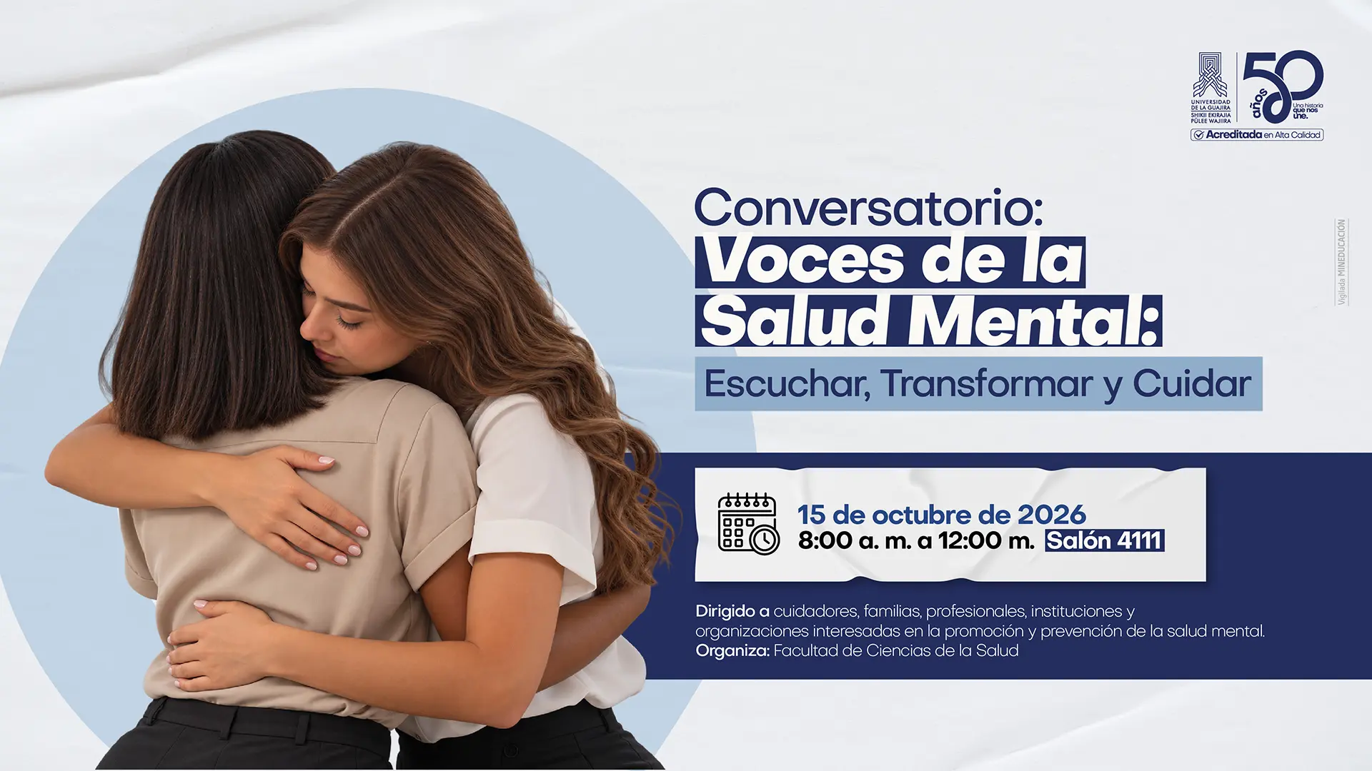 imagen promocional del Conversatorio: Voces de la Salud Mental: Escuchar, Transformar y Cuidar, organizado por la Facultad de Ciencias de la Salud de la Universidad de La Guajira para el 15 de octubre de 2026, de 8:00 a. m. a 12:00 m. en el Salón 4111. El diseño combina tonos azules y blancos con los logos institucionales en la esquina superior derecha y destaca a la izquierda la fotografía de dos mujeres unidas en un abrazo de comprensión y apoyo emocional, acompañado por los detalles del evento dirigido a cuidadores, familias, profesionales y organizaciones